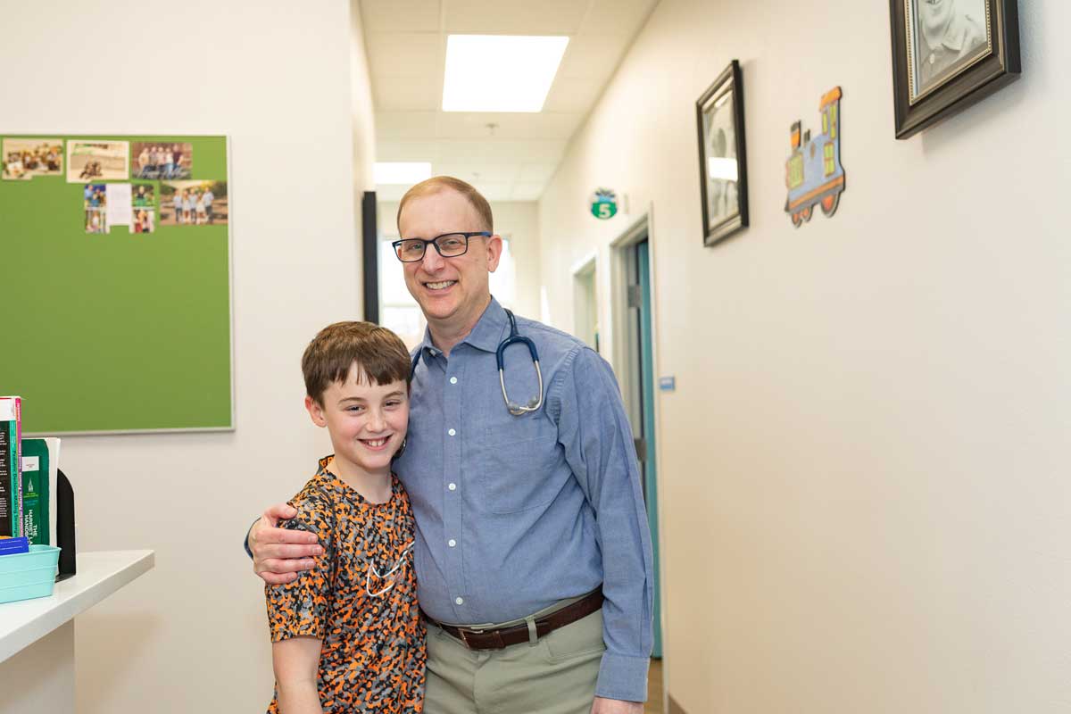 Dr. Seth Kaplan with boy patient