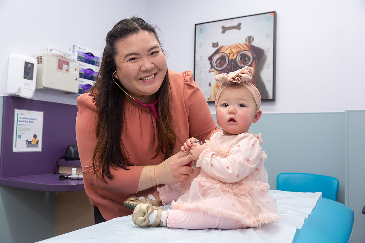 Dr. Nguyen examining girl