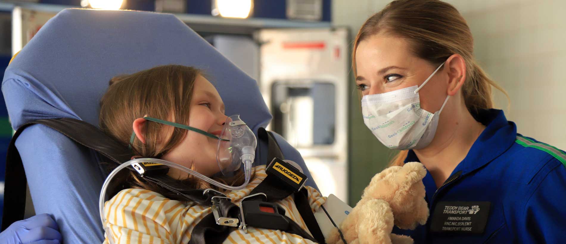 A transport doctor with the patient by ambulance